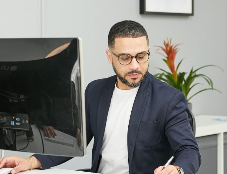 a man sitting at a desk